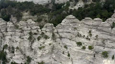 A young man walks down the top of the mountain range Stock Footage 146073213