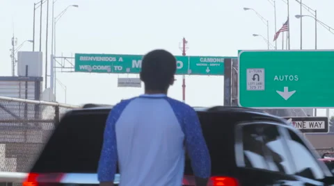 Young Man Walks Toward Border Video stock 60123094