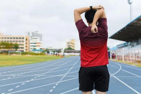 Young man warm up before running. exercise concept. Warm up concept. workout  Stock Photos