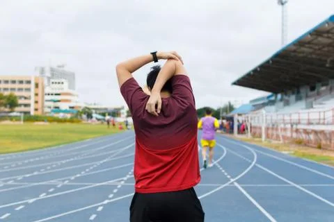 Young man warm up before running. exercise concept. Warm up concept. workout  Stock Photos
