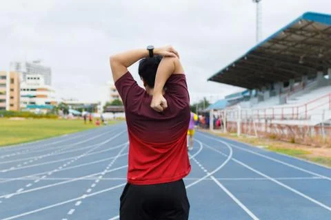 Young man warm up before running. exercise concept. Warm up concept. workout  Stock Photos