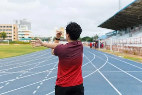 Young man warm up before running. exercise concept. Warm up concept. workout  Stock Photos