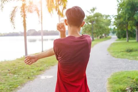 Young man warm up before running. exercise concept. Warm up concept. workout  Stock Photos