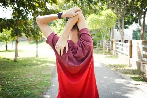 Young man warm up before running. exercise concept. Warm up concept. workout  Stock Photos