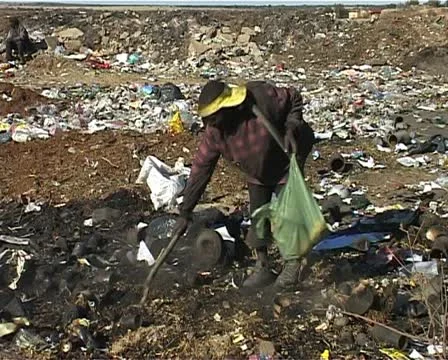 A young man at the waste site Stock Footage 11496820