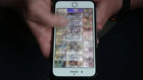 Young Man Watching and Read News on Smart Phone Close-up. Casual Male Browse Web 스톡 동영상 240753394