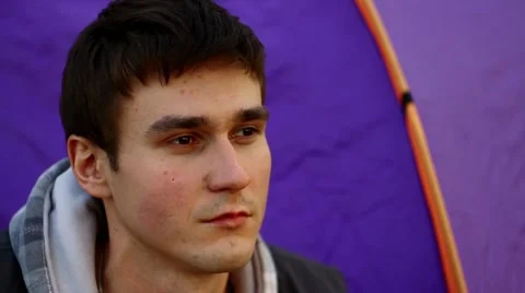 Young man watching something unexpected. C. U. Video stock 10749487