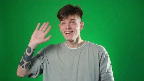 Young man waving with hand Stock Footage 209132568