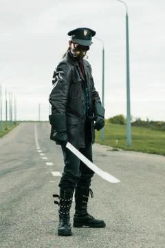 Young man weared in steampunk style Фото