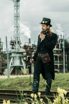 Young man weared in steampunk style Stock Photos