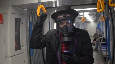 Young man wearing black protective mask and medical gloves against coronavirus Stock Footage 126894908