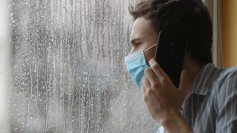 Young  man wearing a face mask Stock Footage 126100333