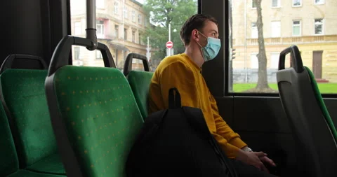 Young man wearing face protective medical mask for protection from virus disease Stock Footage 133423878