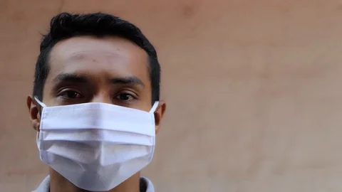 A Young Man Wearing Surgical Face Mask To Prevent Flu Disease Corona Virus Stock Footage