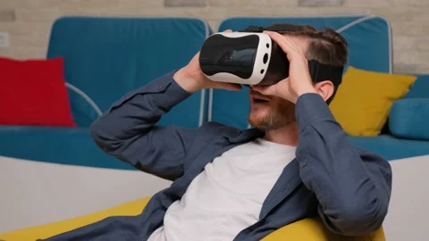 Young man wearing virtual reality headset. Augmented Reality. Stock Footage 140783511