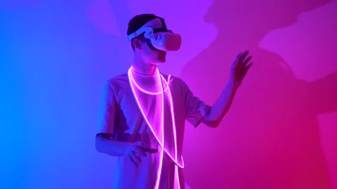Young man wearing Virtual reality glass working on simulation screen analyzing Stock Footage 166493785
