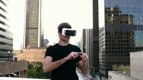 Young Man Wearing Vr Headset Reaching Out His Hands.  4k slow motion. Stock Footage 87484911