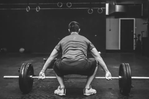 Young man with weight training  Stock Photos
