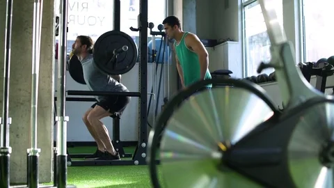 Young man weightlifting 動画素材 77082232