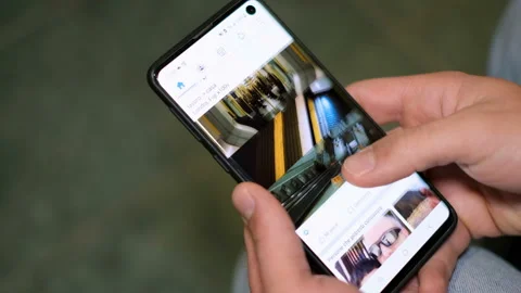 Young man while compulsive using social media apps on a smartphone,addiction Stock Footage 144527704