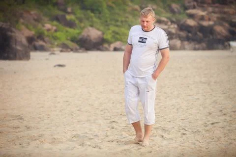 Young man in white Stock Photos