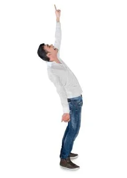 Young man winner pointing up Stock Photos