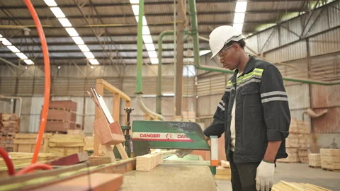 Young man worker work in a woodworking factory, Video stock 253888342