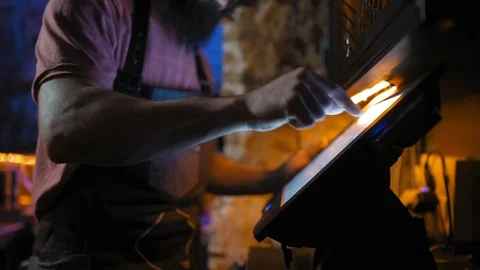Young man, working in bar, using card reader Stock-Footage 126908524