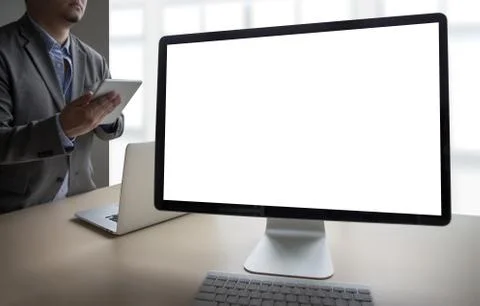 Young man working Businessman using a desktop computer of the blank screen Stock Photos
