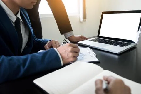 Young man working Businessman using a desktop computer of the blank screen. Stock Photos