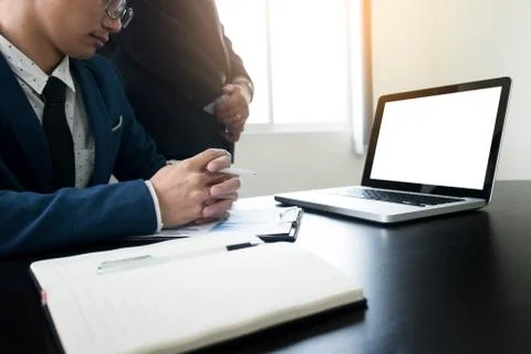 Young man working Businessman using a desktop computer of the blank screen. Stock Photos