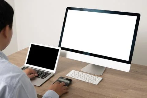 Young man working Businessman using a desktop computer of the blank screen 스톡 사진
