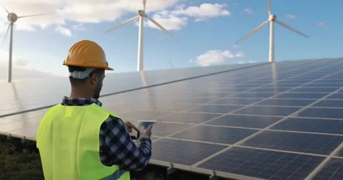 Young man working checking solar panels with digital tablet Stock Footage 149302732