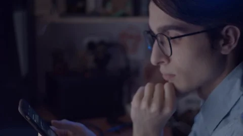 Young man working at computer Stock Footage 128027912