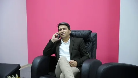 Young man is working on a computer - laptop computer showing charts and graphs.  Stock Footage 81470449