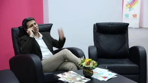 Young man is working on a computer - laptop computer showing charts and graphs.  Stock Footage 81470464