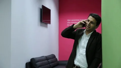 Young man is working on a computer - laptop computer showing charts and graphs.  Stock Footage 81470520