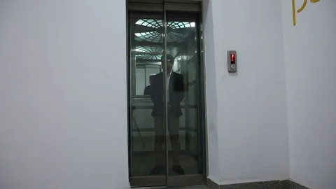 Young man is working on a computer - laptop computer showing charts and graphs.  Stock Footage 81470594