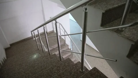 Young man is working on a computer - laptop computer showing charts and graphs.  Stock Footage 81470956