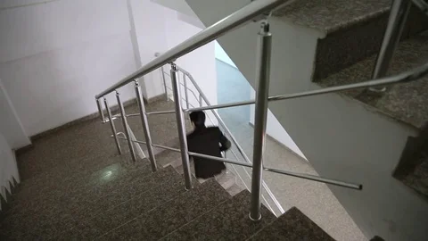 Young man is working on a computer - laptop computer showing charts and graphs.  Stock Footage 81470987