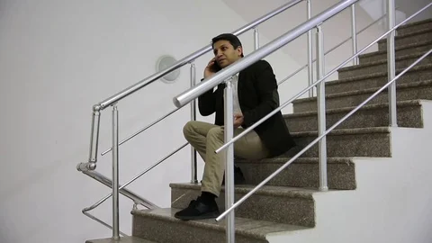Young man is working on a computer - laptop computer showing charts and graphs.  Stock Footage 81471075
