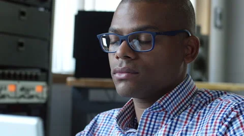 Young man working on computer in the office, close up Stock Footage 53463051