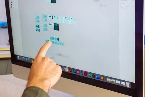 Young man working on computer in office Stock Photos