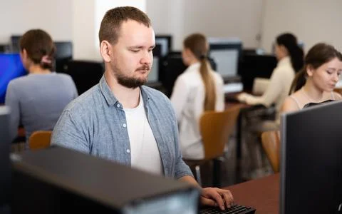 Young man working on computer in office Foto stock