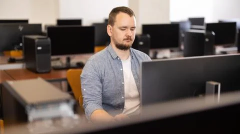 Young man working on computer in office Foto stock