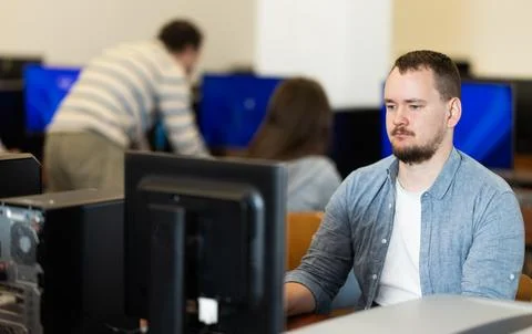 Young man working on computer in office Foto stock