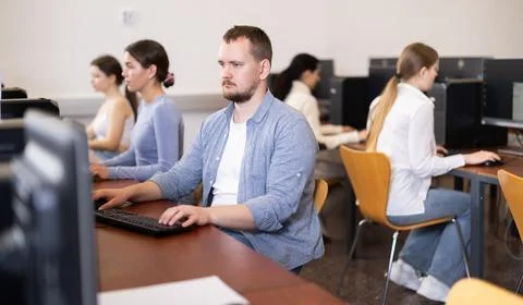 Young man working on computer in office Foto stock