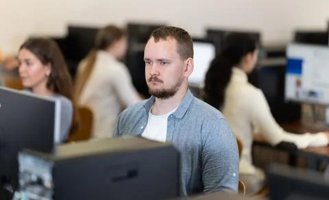 Young man working on computer in office Foto stock