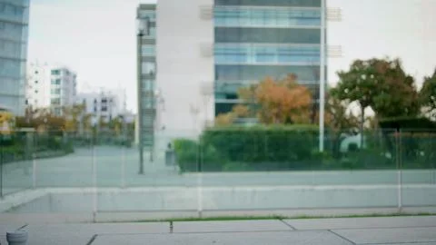 Young man working computer outdoor close up. Hipster guy using laptop at street Foto stock