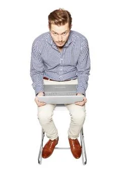 Young man working on a computer Stock Photos